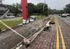 Carro derruba poste com câmera de monitoramento e danifica grade de imobiliária no Urbanova